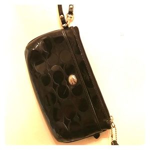 Coach_imprinted_wristlet